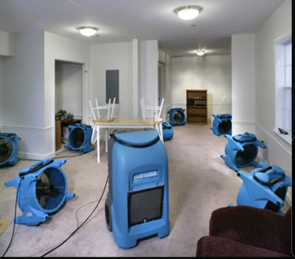 Air movers and dehumidifier setup for Water Extraction & Removal in Utica